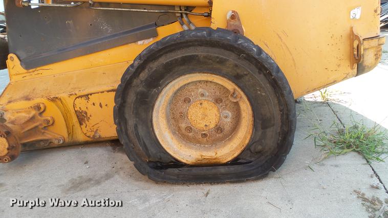 image for item DD7318 Case 445 skid steer