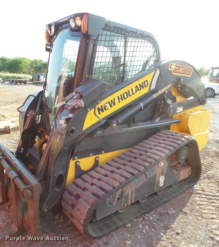 image for item EN9621 2015 New Holland C238 skid steer