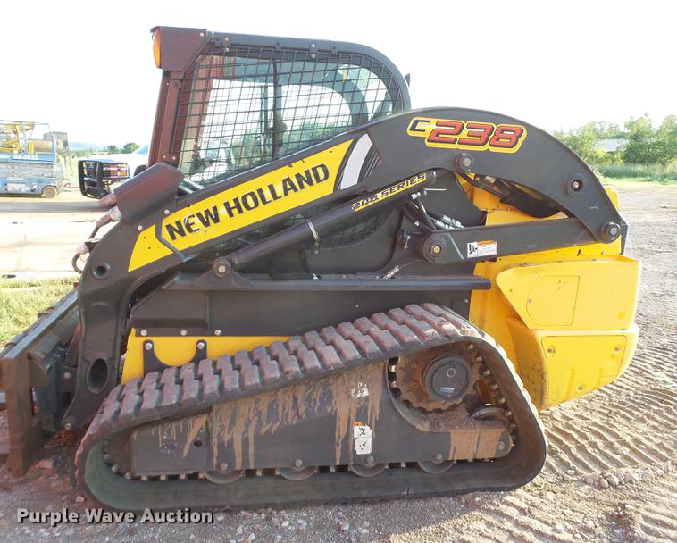 image for item EN9621 2015 New Holland C238 skid steer