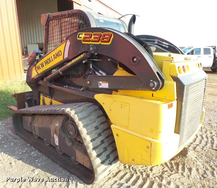 image for item EN9621 2015 New Holland C238 skid steer