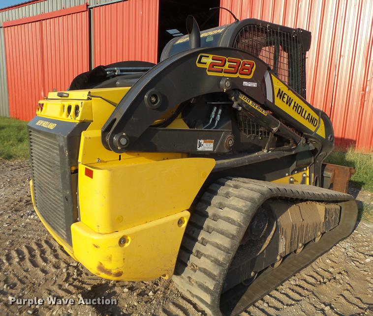 image for item EN9621 2015 New Holland C238 skid steer