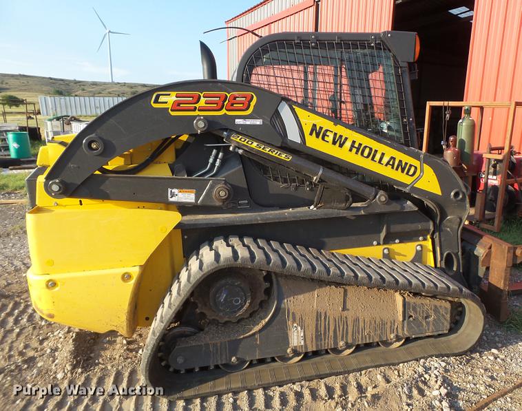 image for item EN9621 2015 New Holland C238 skid steer