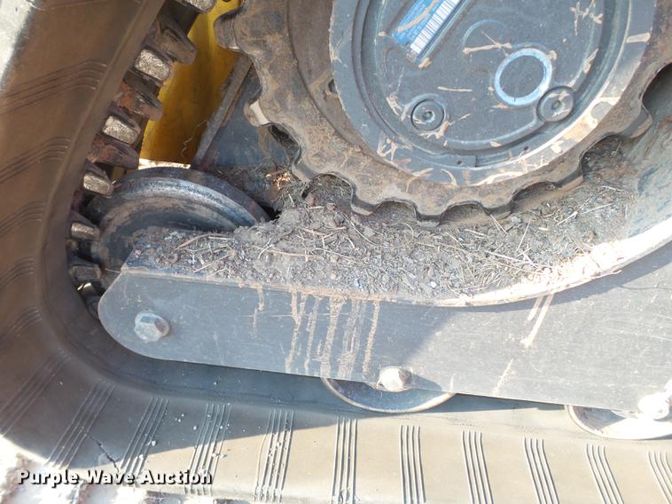 image for item EN9621 2015 New Holland C238 skid steer