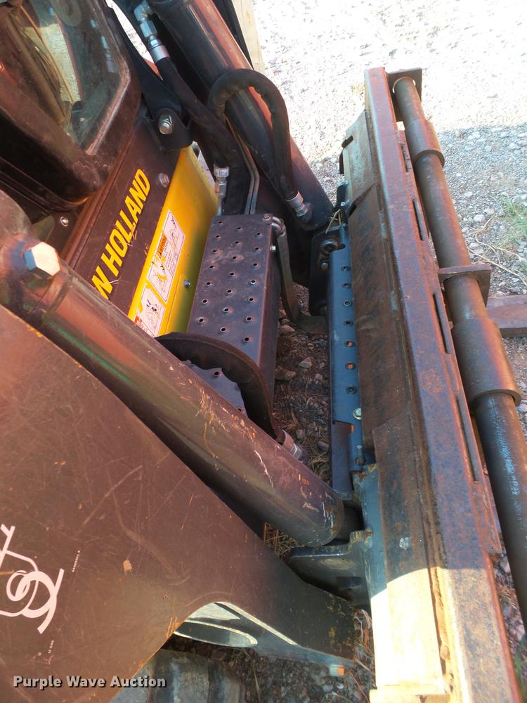 image for item EN9621 2015 New Holland C238 skid steer