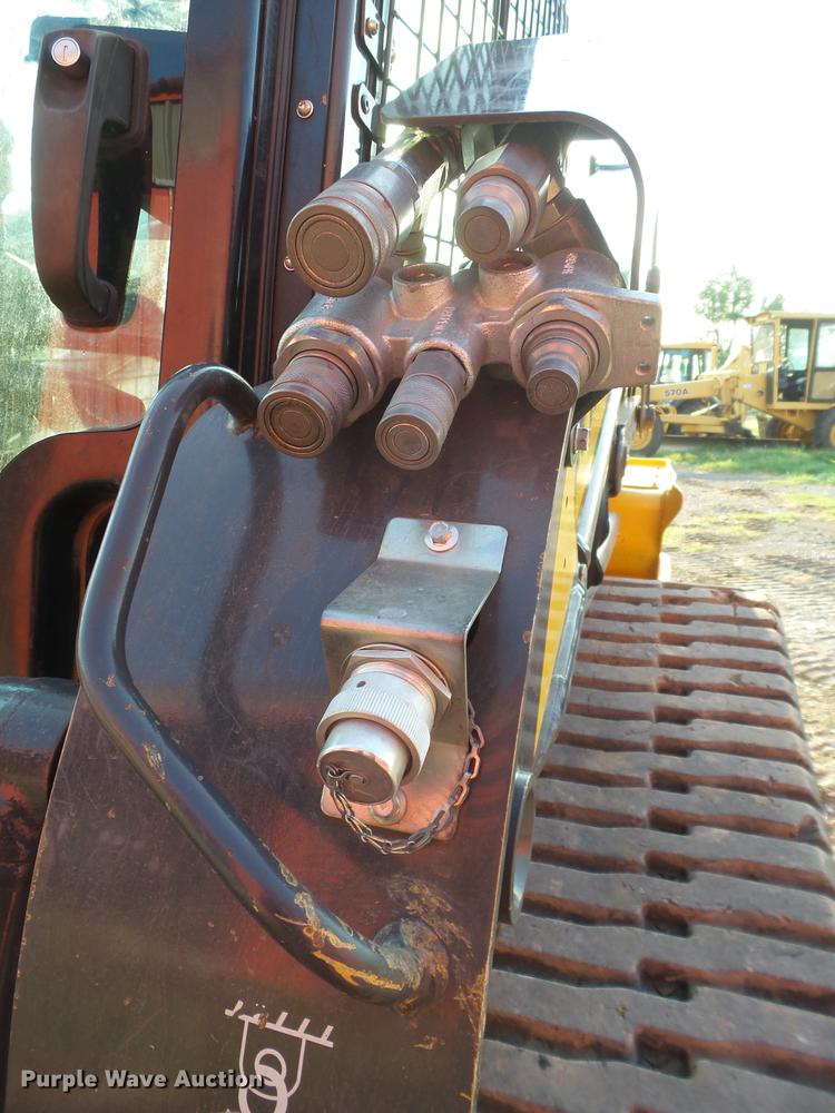 image for item EN9621 2015 New Holland C238 skid steer