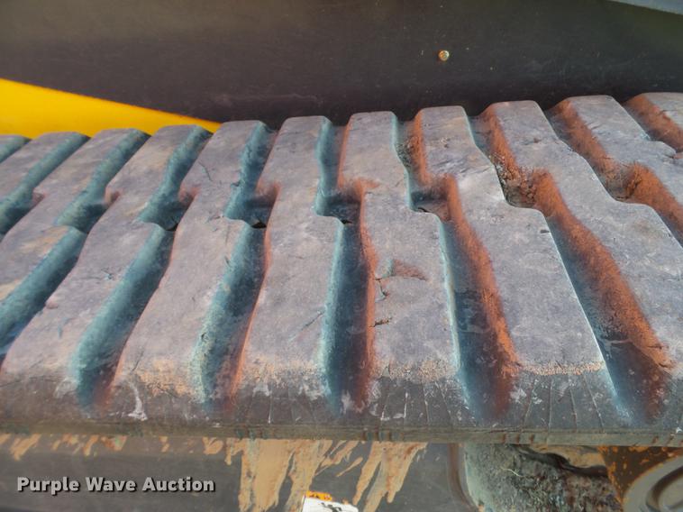 image for item EN9621 2015 New Holland C238 skid steer