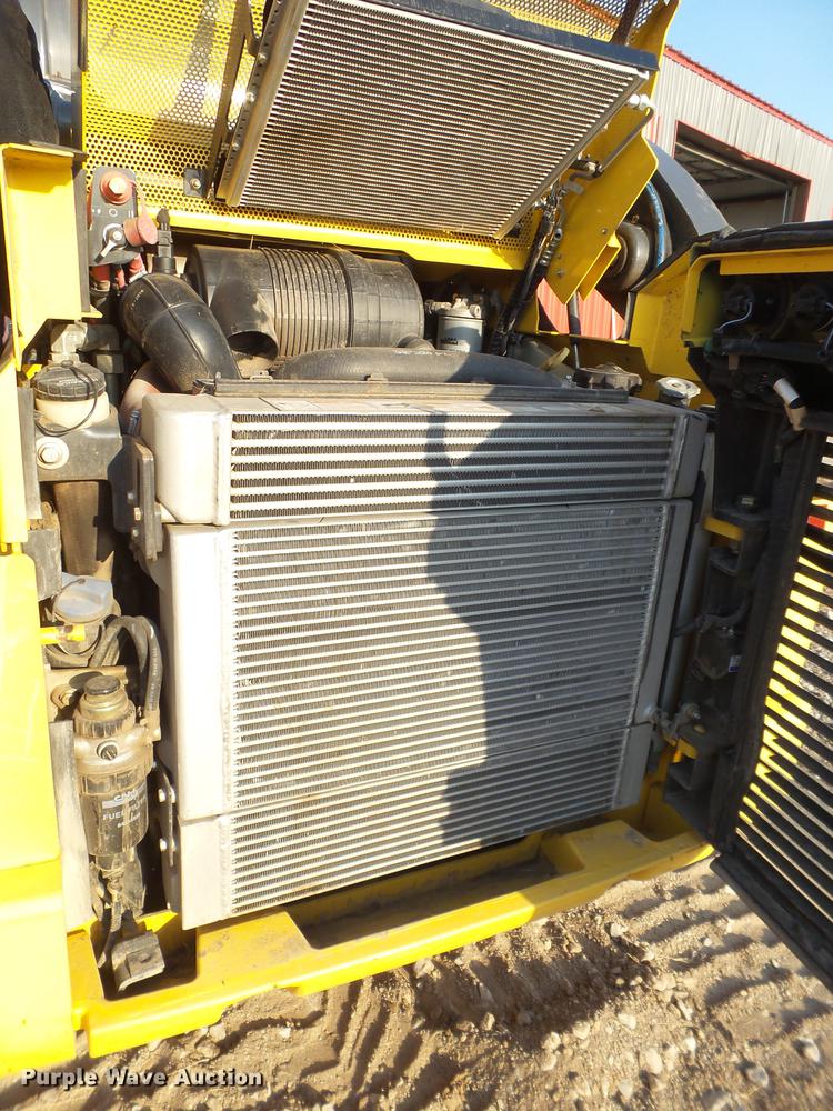 image for item EN9621 2015 New Holland C238 skid steer