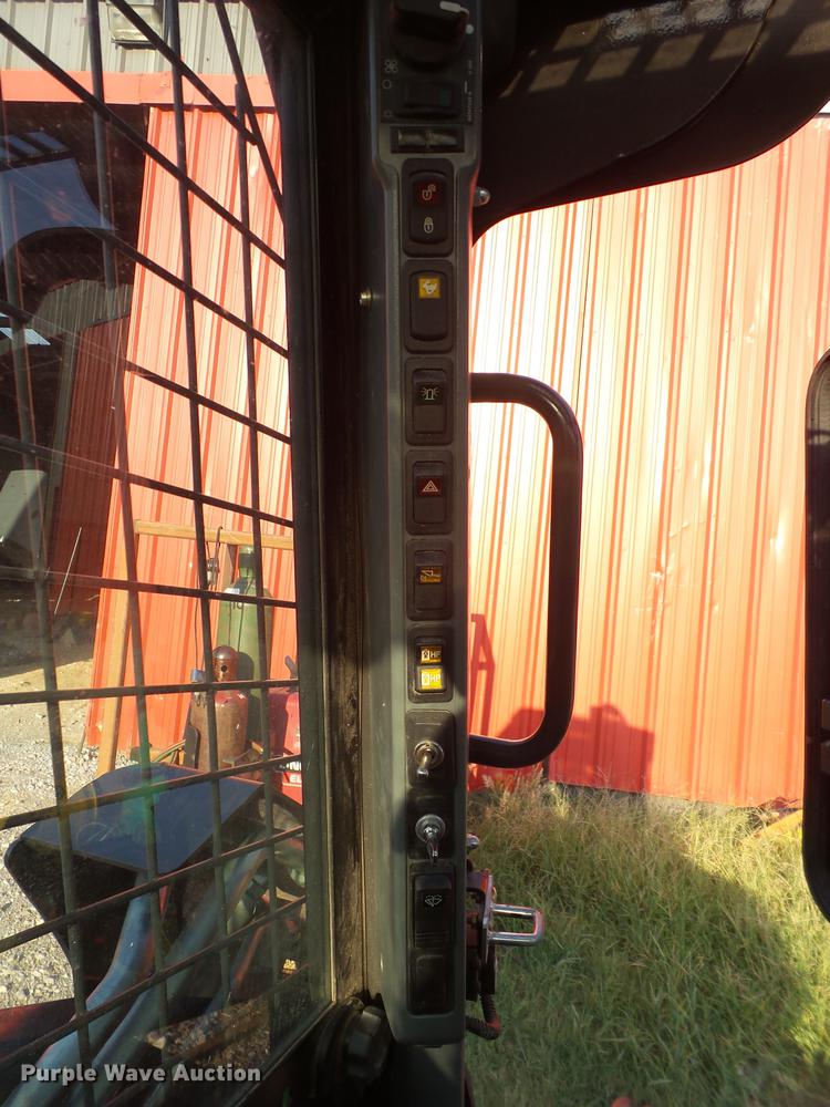 image for item EN9621 2015 New Holland C238 skid steer