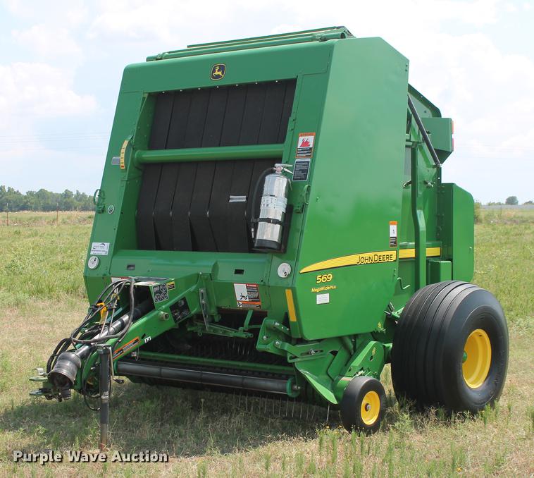image for item DD5237 2015 John Deere 569 Mega Wide Plus round baler