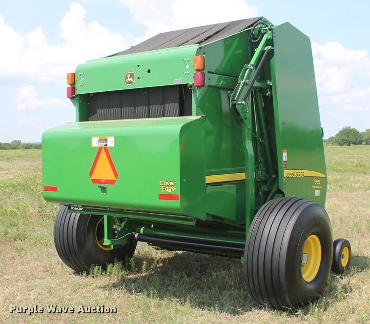 image for item DD5237 2015 John Deere 569 Mega Wide Plus round baler