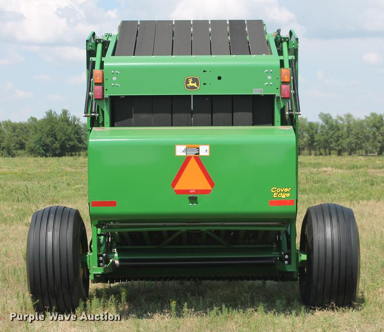 image for item DD5237 2015 John Deere 569 Mega Wide Plus round baler
