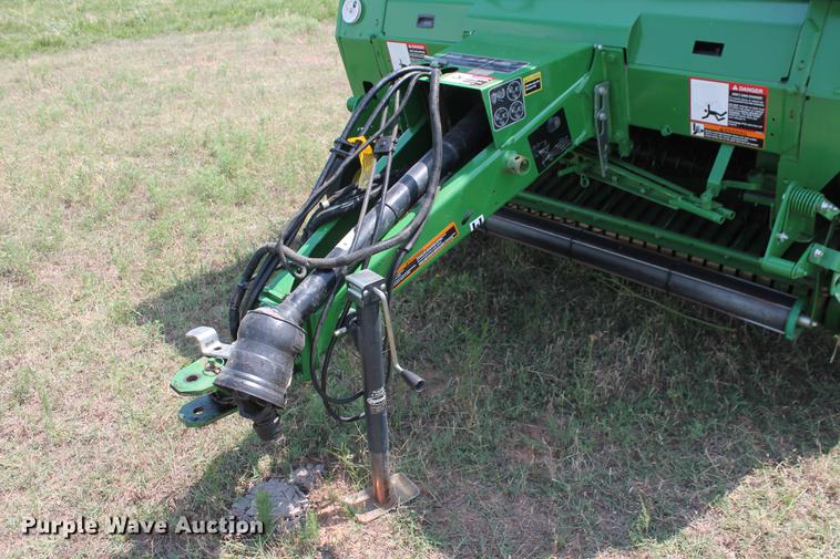 image for item DD5237 2015 John Deere 569 Mega Wide Plus round baler