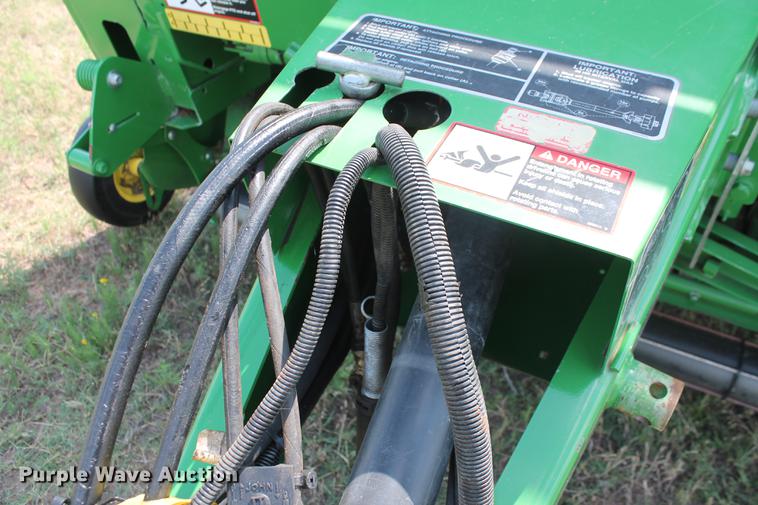 image for item DD5237 2015 John Deere 569 Mega Wide Plus round baler