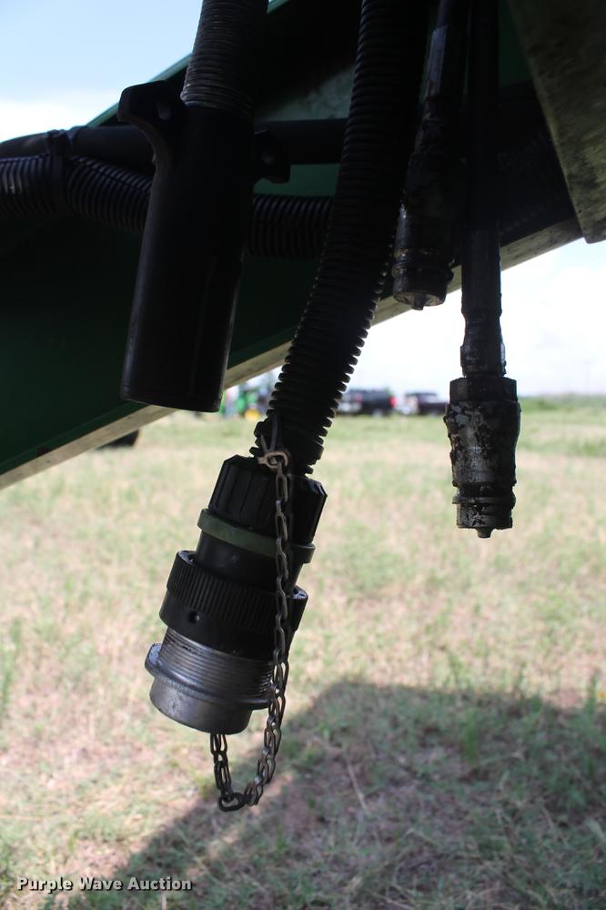 image for item DD5237 2015 John Deere 569 Mega Wide Plus round baler