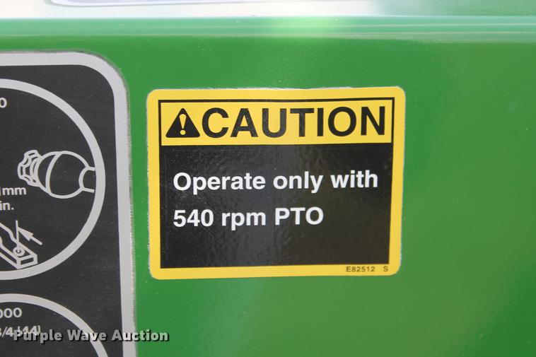 image for item DD5237 2015 John Deere 569 Mega Wide Plus round baler