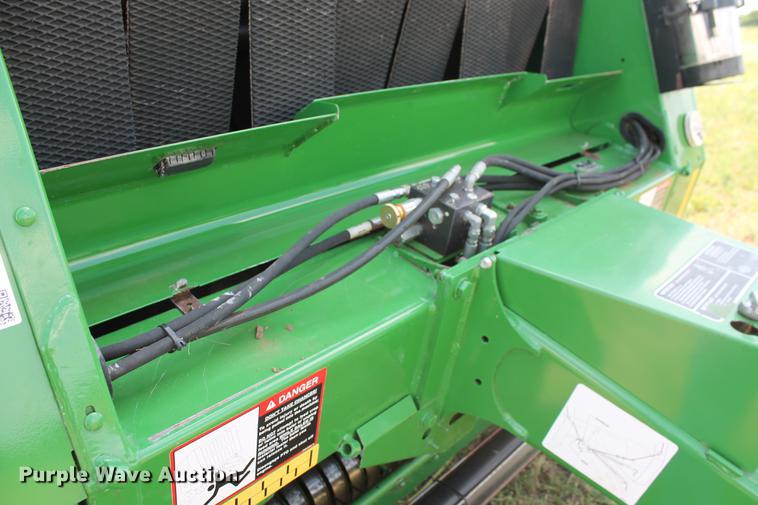 image for item DD5237 2015 John Deere 569 Mega Wide Plus round baler