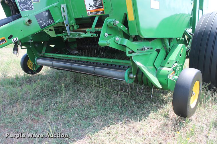 image for item DD5237 2015 John Deere 569 Mega Wide Plus round baler