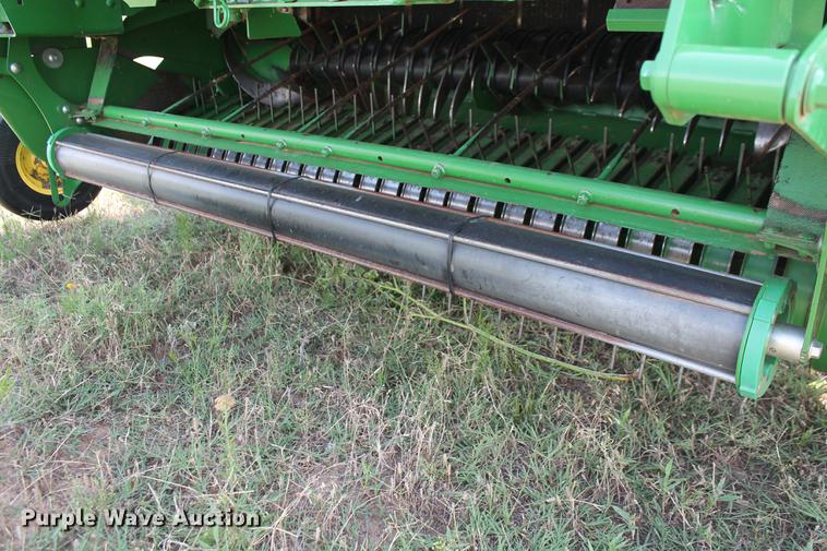 image for item DD5237 2015 John Deere 569 Mega Wide Plus round baler
