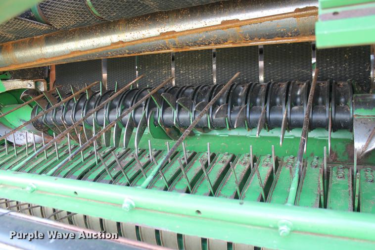 image for item DD5237 2015 John Deere 569 Mega Wide Plus round baler