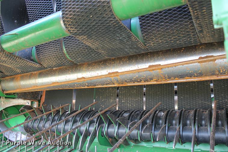 image for item DD5237 2015 John Deere 569 Mega Wide Plus round baler