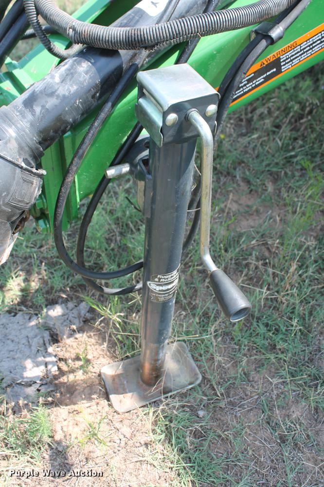 image for item DD5237 2015 John Deere 569 Mega Wide Plus round baler