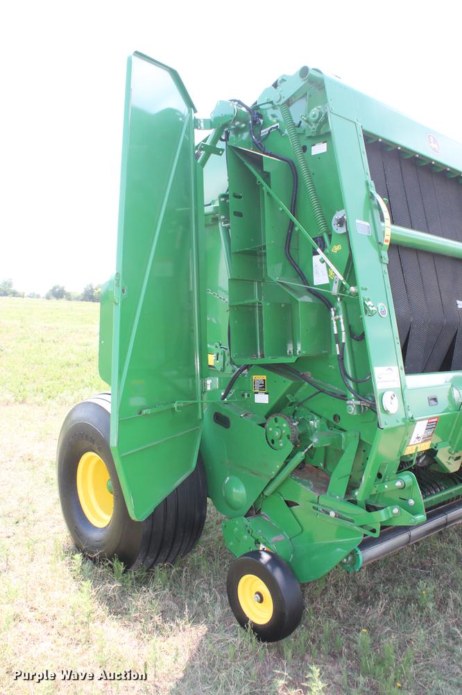 image for item DD5237 2015 John Deere 569 Mega Wide Plus round baler