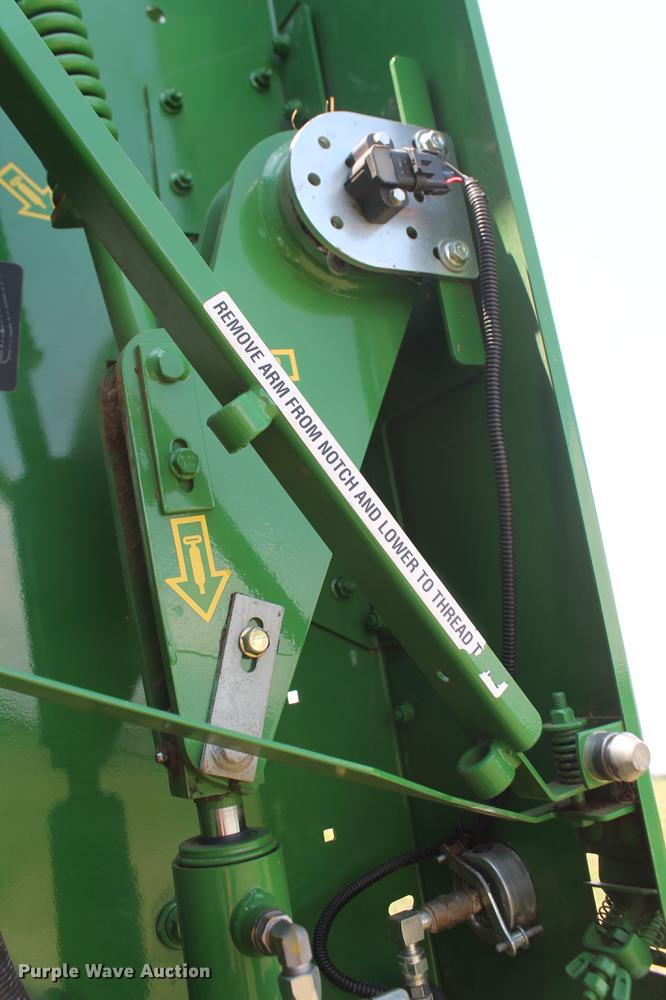 image for item DD5237 2015 John Deere 569 Mega Wide Plus round baler