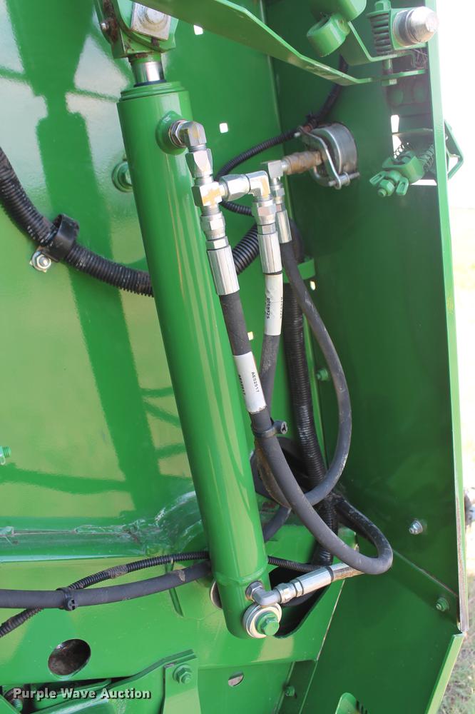 image for item DD5237 2015 John Deere 569 Mega Wide Plus round baler