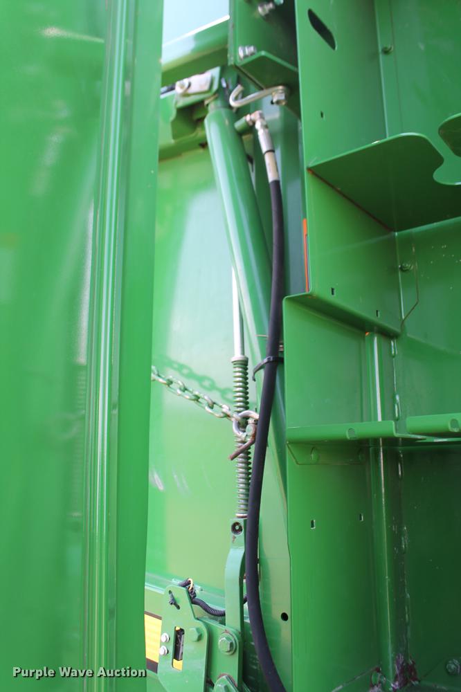 image for item DD5237 2015 John Deere 569 Mega Wide Plus round baler