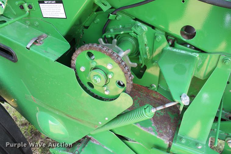 image for item DD5237 2015 John Deere 569 Mega Wide Plus round baler