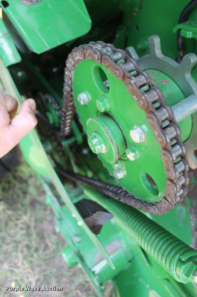 image for item DD5237 2015 John Deere 569 Mega Wide Plus round baler