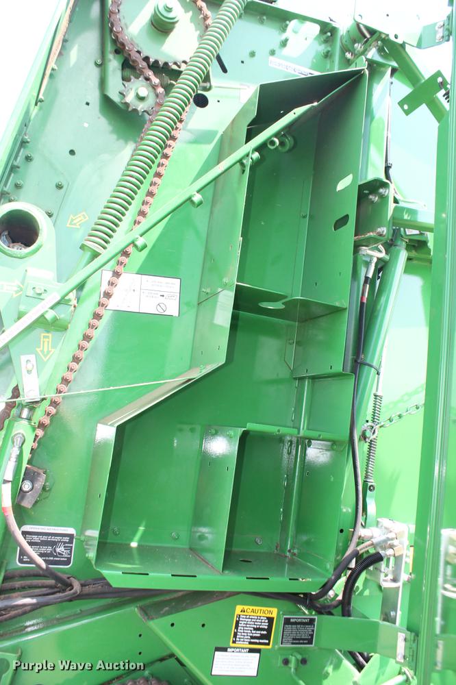 image for item DD5237 2015 John Deere 569 Mega Wide Plus round baler