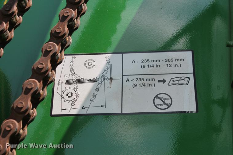 image for item DD5237 2015 John Deere 569 Mega Wide Plus round baler