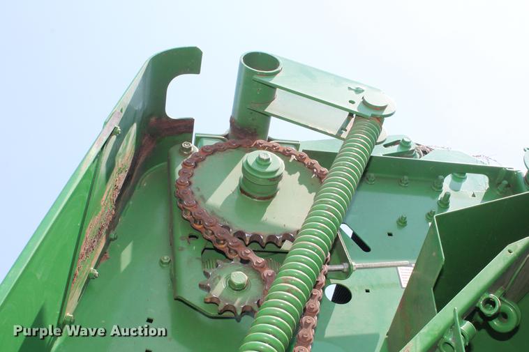 image for item DD5237 2015 John Deere 569 Mega Wide Plus round baler
