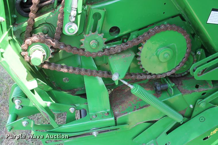 image for item DD5237 2015 John Deere 569 Mega Wide Plus round baler