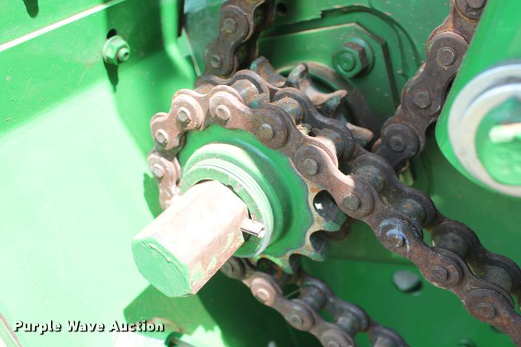 image for item DD5237 2015 John Deere 569 Mega Wide Plus round baler