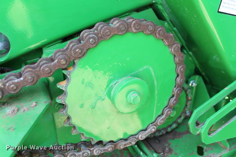 image for item DD5237 2015 John Deere 569 Mega Wide Plus round baler