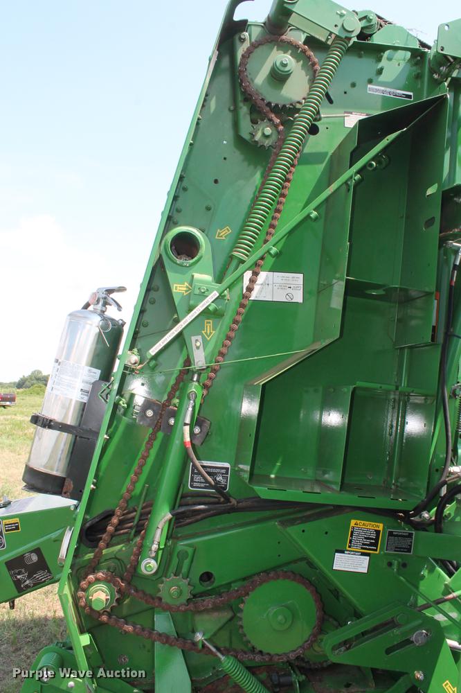image for item DD5237 2015 John Deere 569 Mega Wide Plus round baler