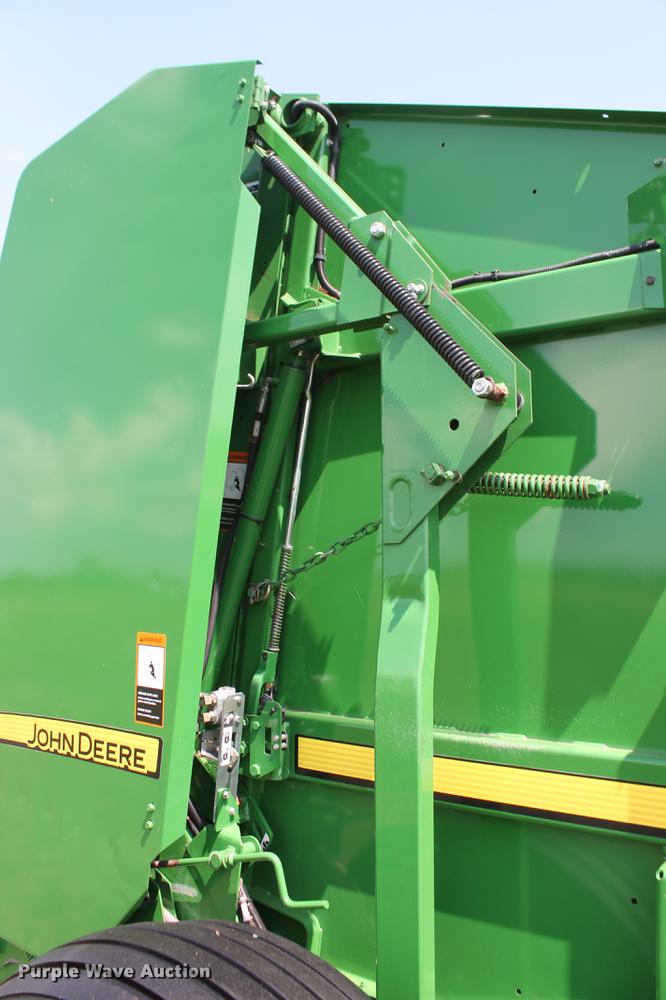 image for item DD5237 2015 John Deere 569 Mega Wide Plus round baler