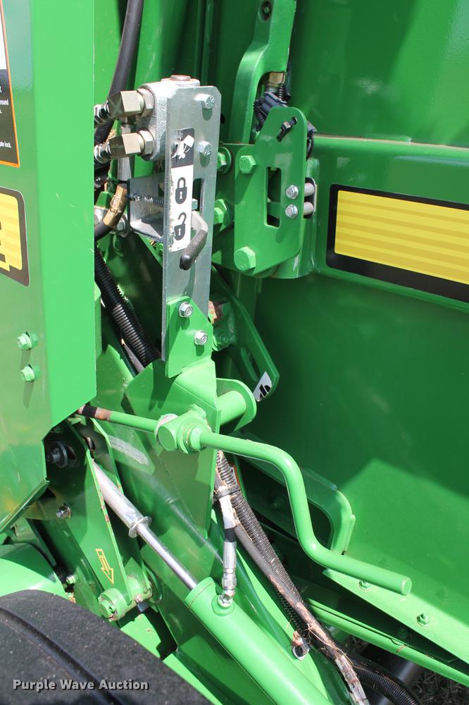 image for item DD5237 2015 John Deere 569 Mega Wide Plus round baler