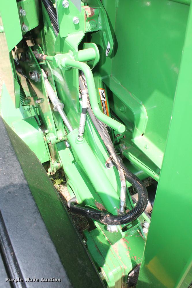 image for item DD5237 2015 John Deere 569 Mega Wide Plus round baler