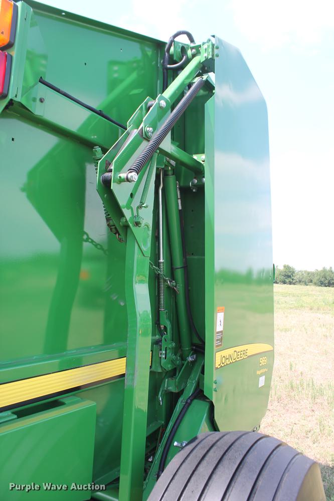 image for item DD5237 2015 John Deere 569 Mega Wide Plus round baler
