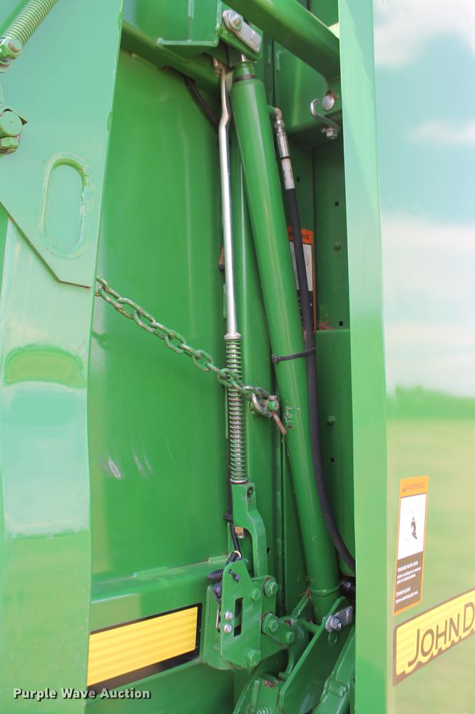 image for item DD5237 2015 John Deere 569 Mega Wide Plus round baler