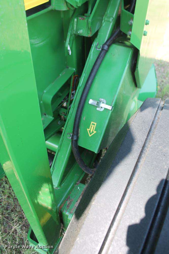 image for item DD5237 2015 John Deere 569 Mega Wide Plus round baler