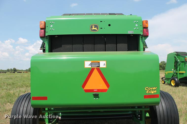 image for item DD5237 2015 John Deere 569 Mega Wide Plus round baler