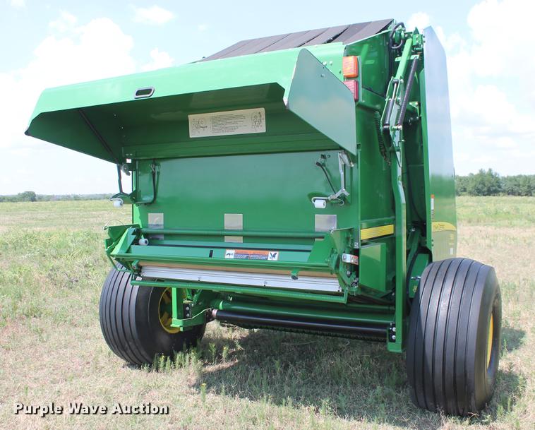 image for item DD5237 2015 John Deere 569 Mega Wide Plus round baler