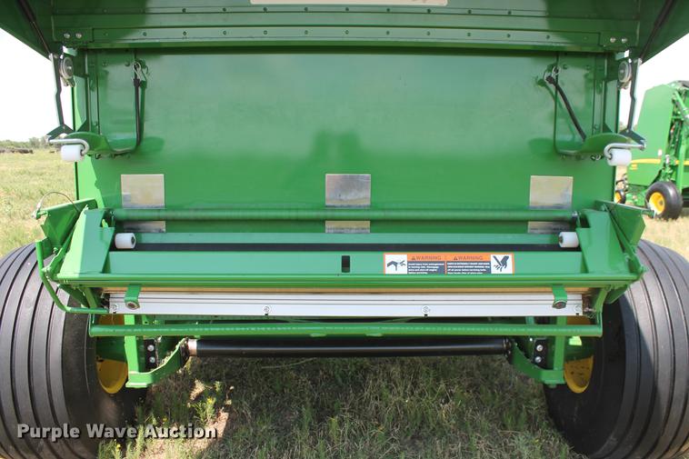 image for item DD5237 2015 John Deere 569 Mega Wide Plus round baler