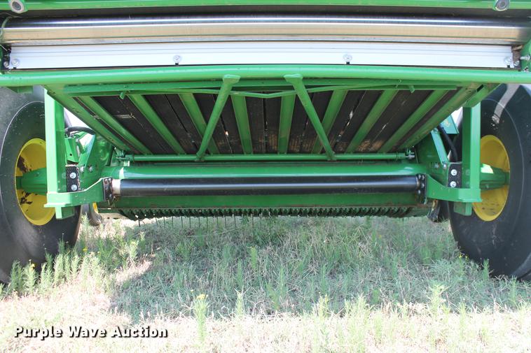 image for item DD5237 2015 John Deere 569 Mega Wide Plus round baler