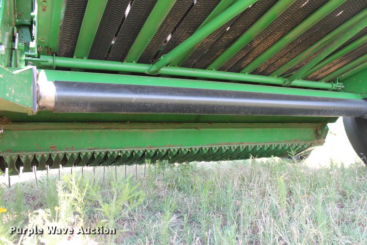 image for item DD5237 2015 John Deere 569 Mega Wide Plus round baler