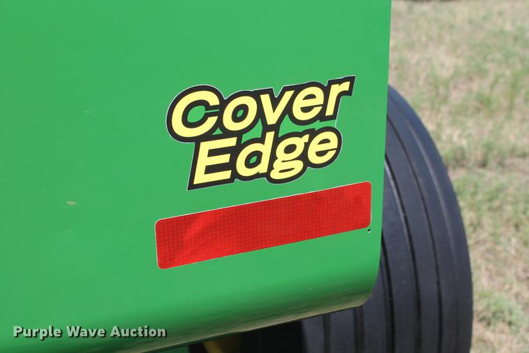 image for item DD5237 2015 John Deere 569 Mega Wide Plus round baler